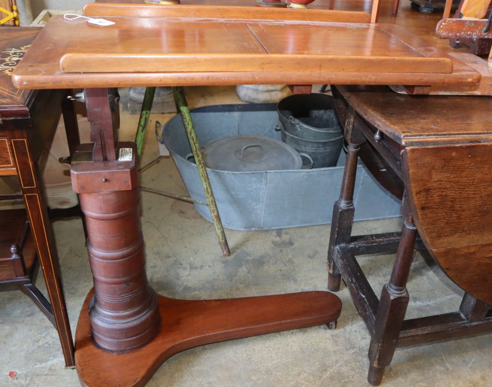 A Victorian mahogany patent adjustable reading table by Leveson & Sons, London, W.80cm, D.40cm